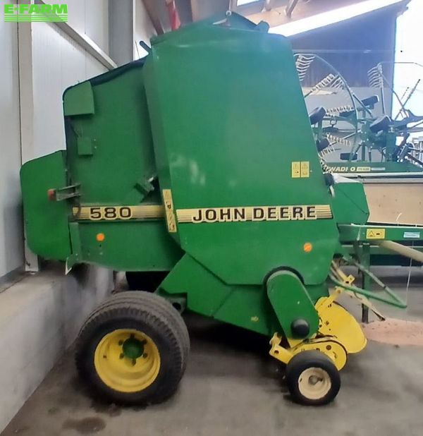 John Deere 580 Presă de balotat 9.500 EUR