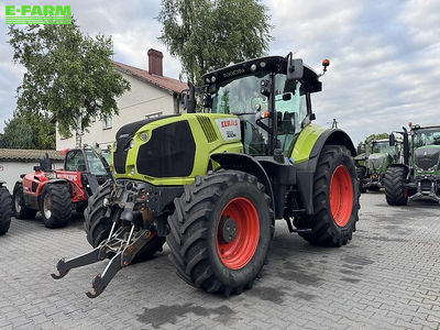 E-FARM: Claas Axion 800 - Tractor - id 11GT2JX - 49.938 EUR - Anul: 2018 - Ore motor: 6.600,Puterea motorului: 200,Polonia