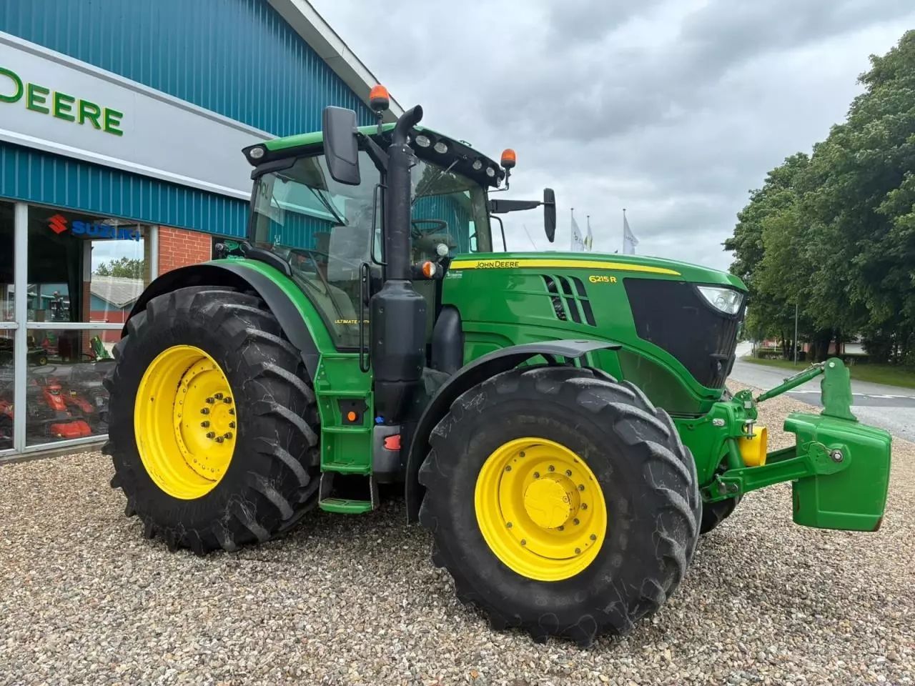 John Deere 6215 R Traktor 133.120 €