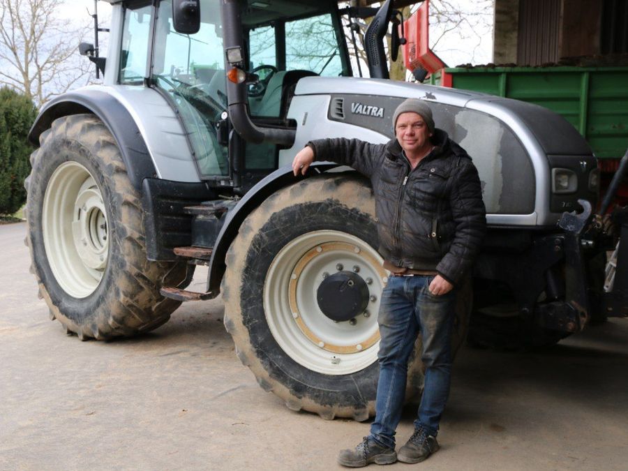 Customer Walter Funk in front of his Valtra T162 tractor